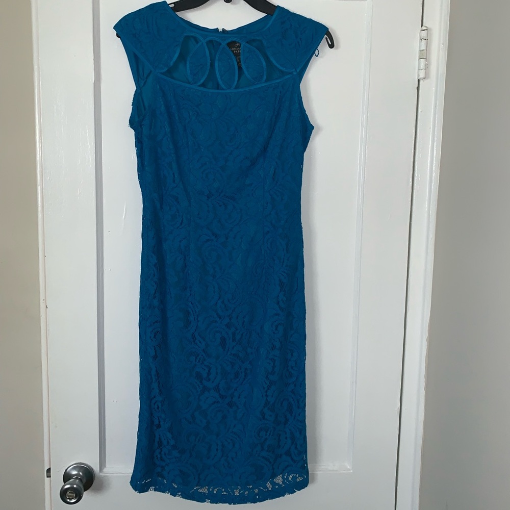 Worn once, beautiful color with top cutouts